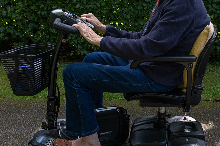 woman on motorized scooter